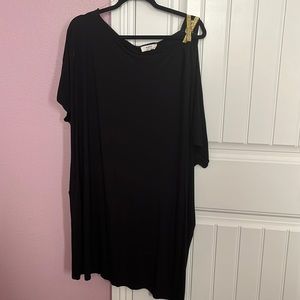Black one shouldered dress with gold strap detail. Plus size.